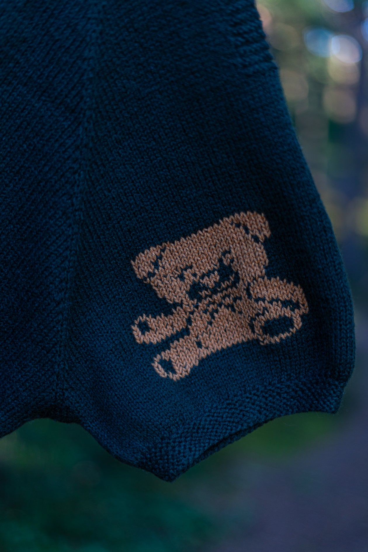 Mežzaļš kombinezons ar izšūtu lācēnu